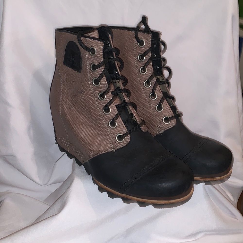 Sorel tan and black wedge booties